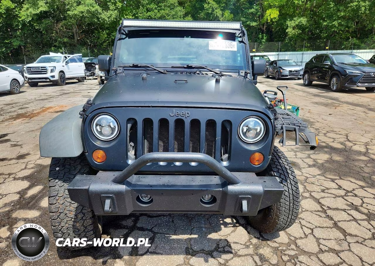 2011 Jeep Wrangler Unlimited Rubicon VIN:1J4BA6H12BL567831 - 5
