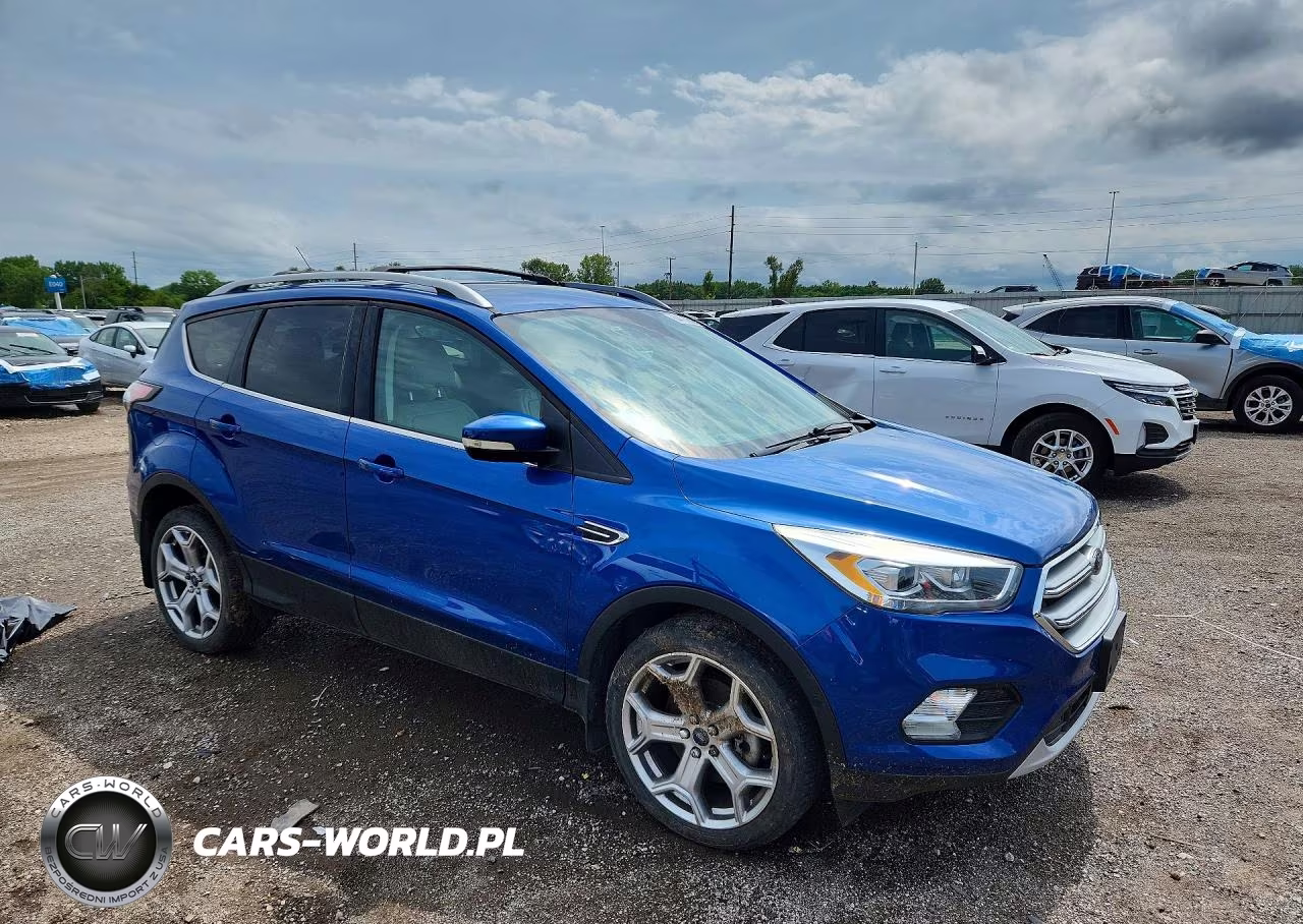2017 Ford Escape Titanium VIN:1FMCU9J99HUC44233 - 4