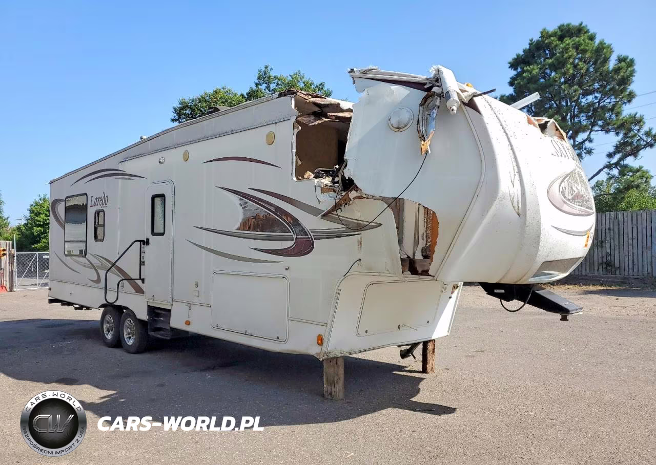 2010 Keystone Laredo Camper VIN:4YDF31628AE600587 - 1