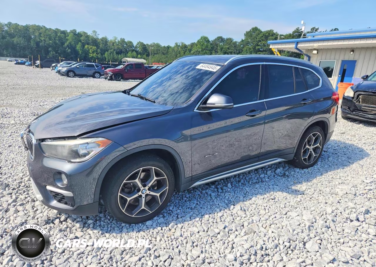 2018 BMW X1 xDrive28I VIN:WBXHT3Z35J4A66374 - 1