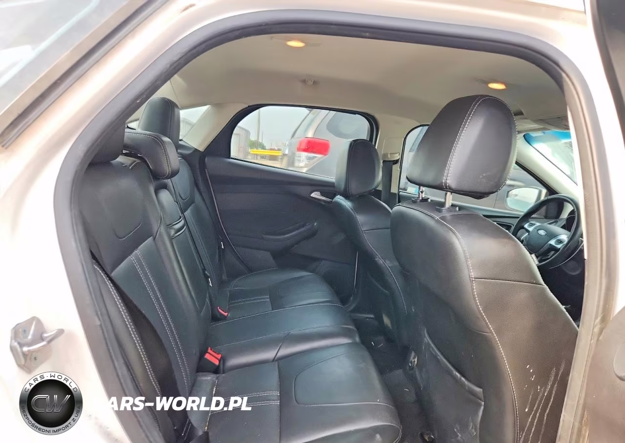 2013 Ford Focus Titanium VIN:1FADP3J21DL144732 - 10