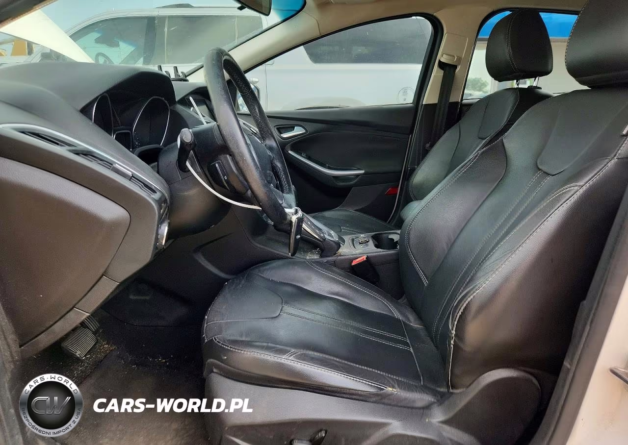 2013 Ford Focus Titanium VIN:1FADP3J21DL144732 - 7