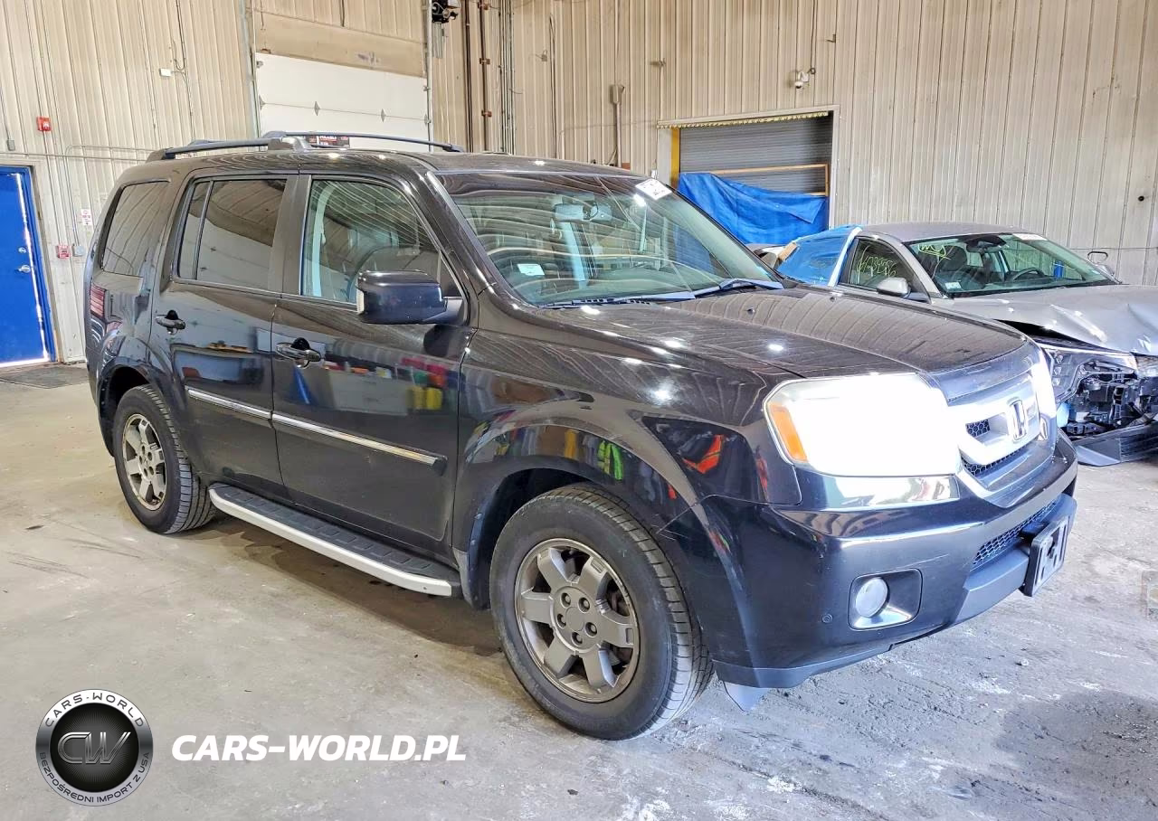 2011 Honda Pilot Touring VIN:5FNYF4H98BB028192 - 4