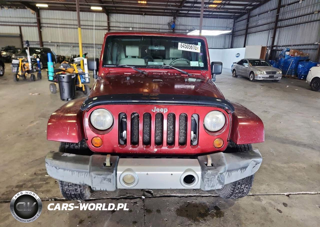 2009 Jeep Wrangler Unlimited Sahara VIN:1J4GA59169L750562 - 5