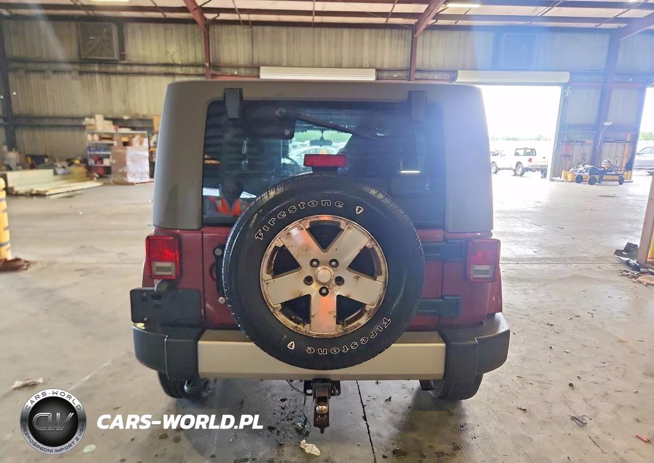 2009 Jeep Wrangler Unlimited Sahara VIN:1J4GA59169L750562 - 6