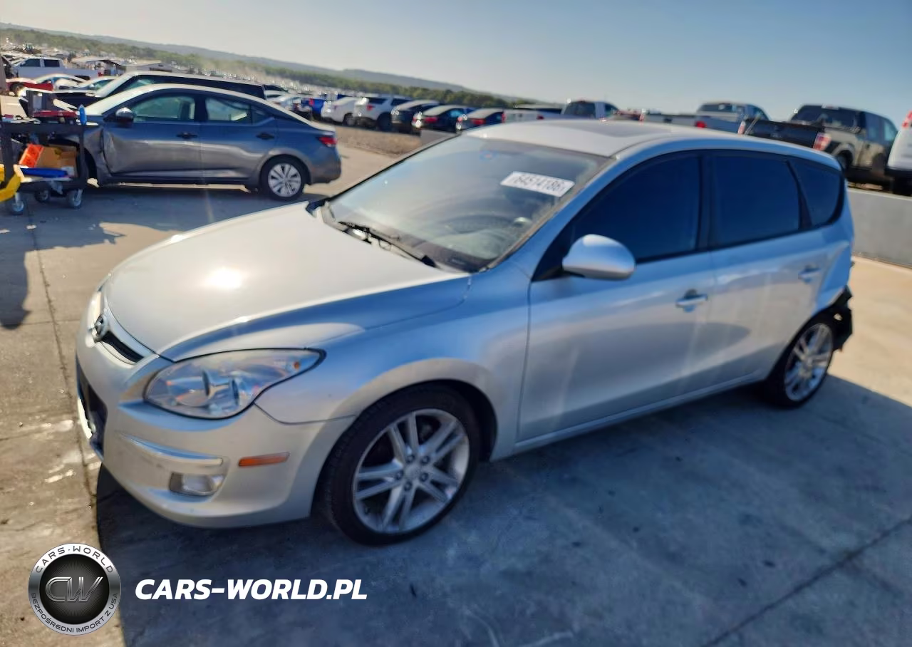 2009 Hyundai Elantra Touring VIN:KMHDC86EX9U034488 - 1