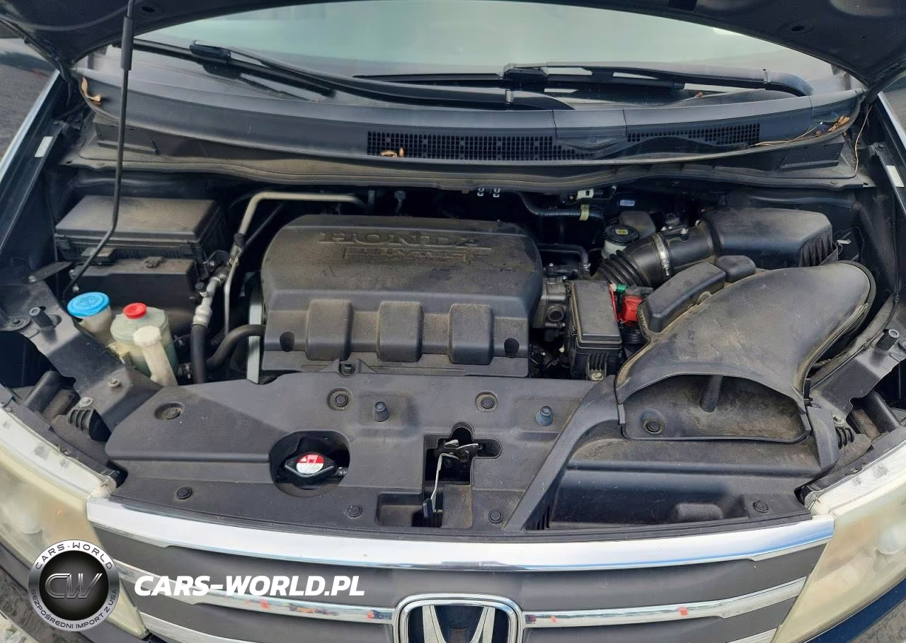 2012 Honda Odyssey Touring VIN:5FNRL5H90CB098077 - 12