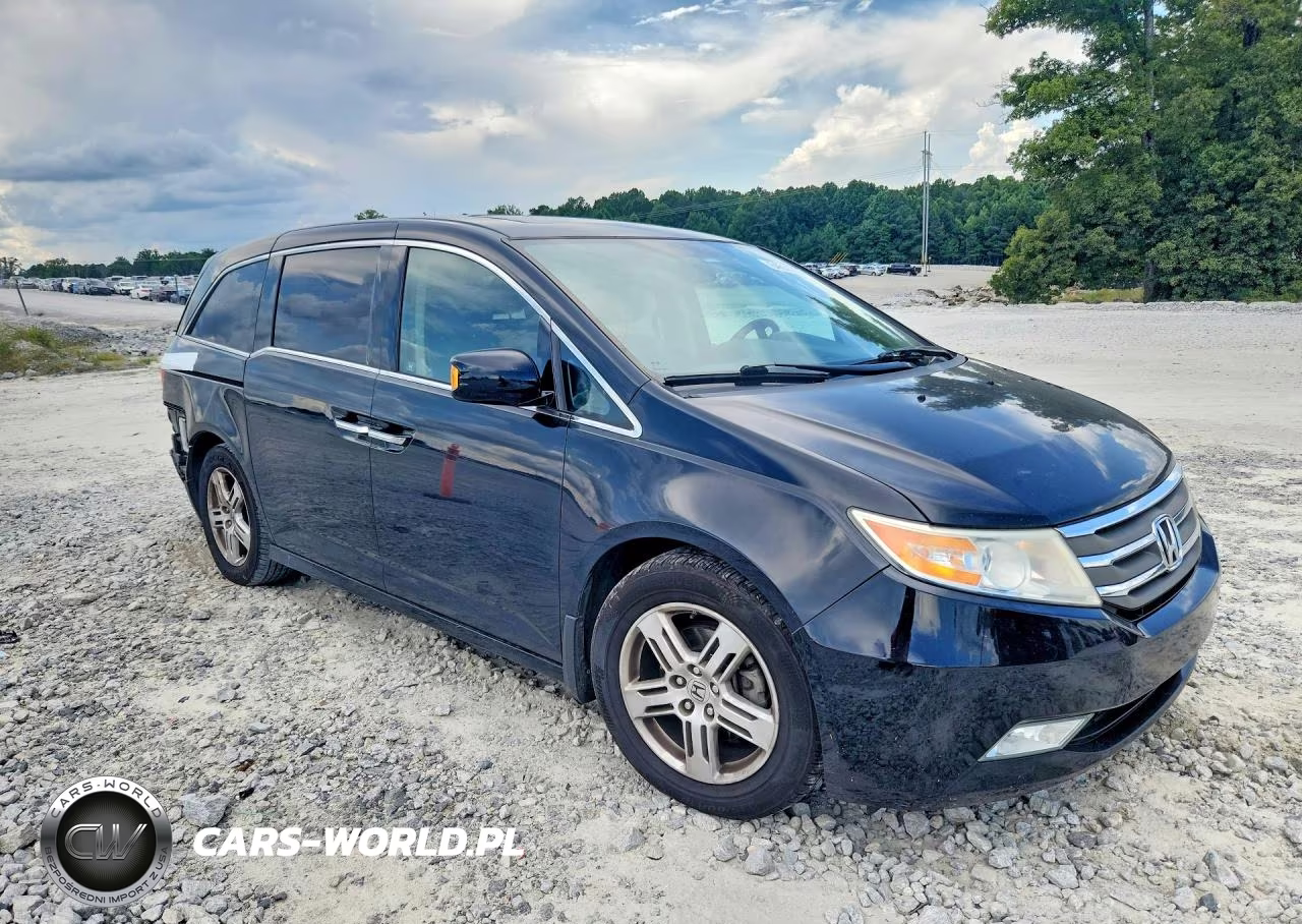 2012 Honda Odyssey Touring VIN:5FNRL5H90CB098077 - 4