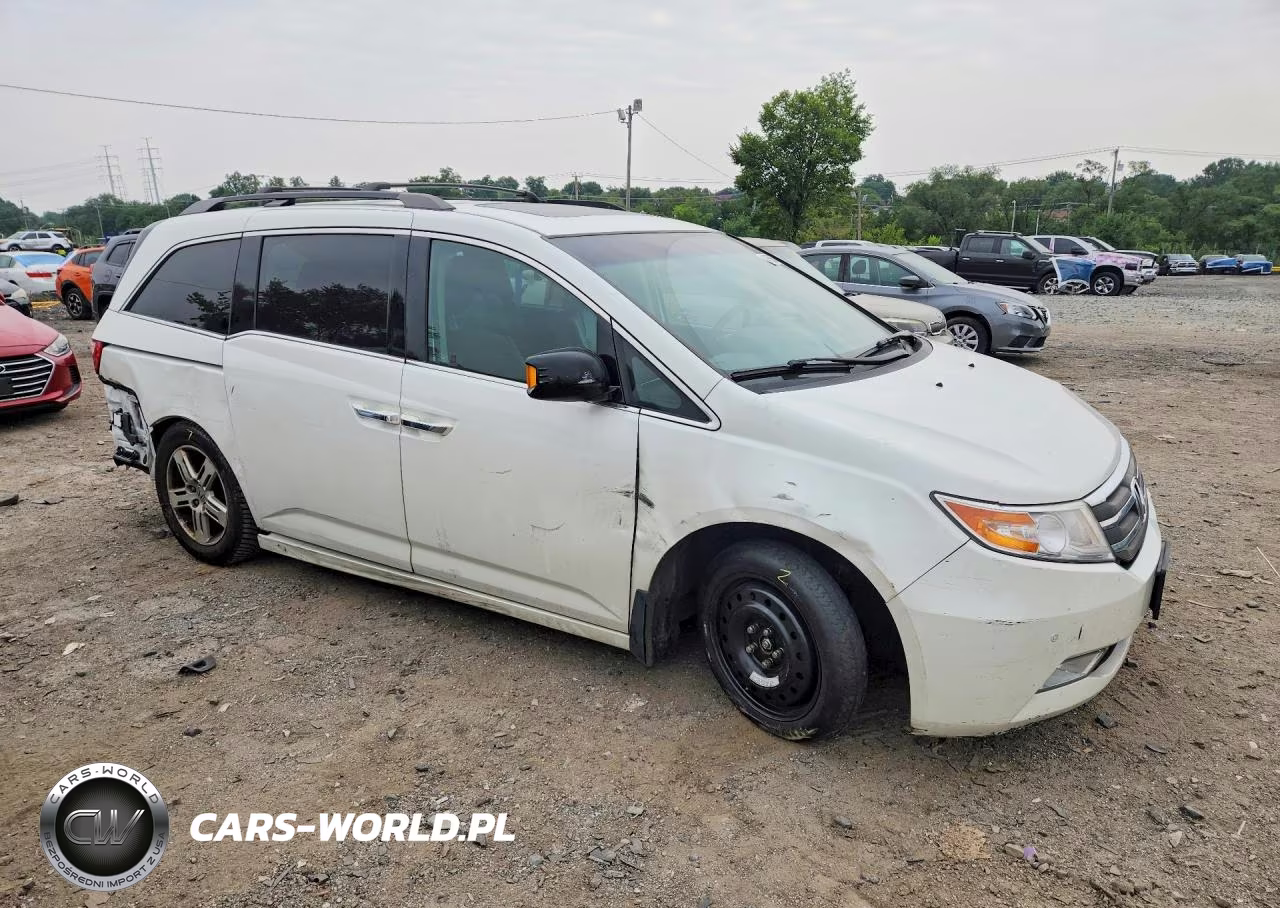 2012 Honda Odyssey Touring VIN:5FNRL5H9XCB118898 - 4