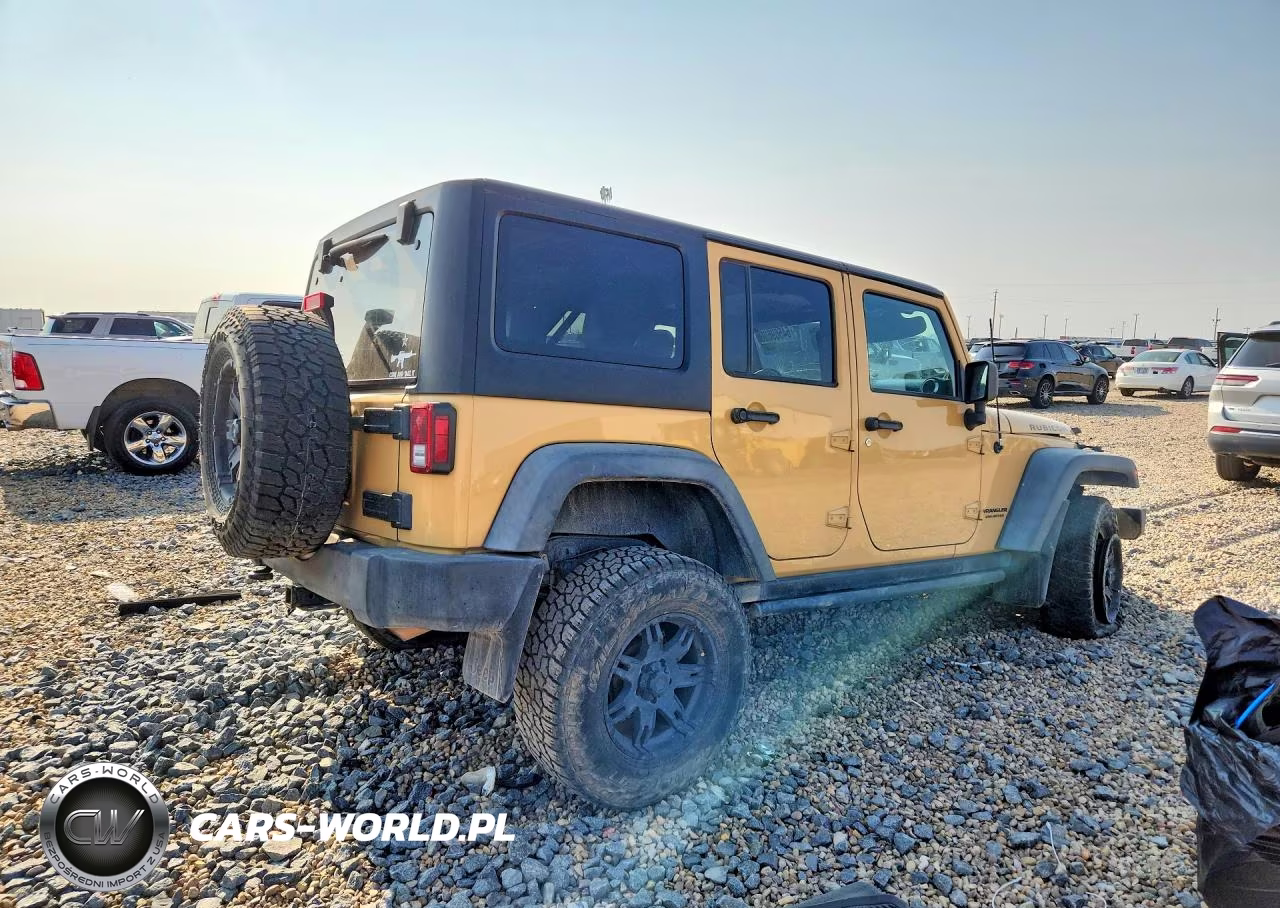 2014 Jeep Wrangler Unlimited Rubicon VIN:1C4HJWFG9EL180253 - 3