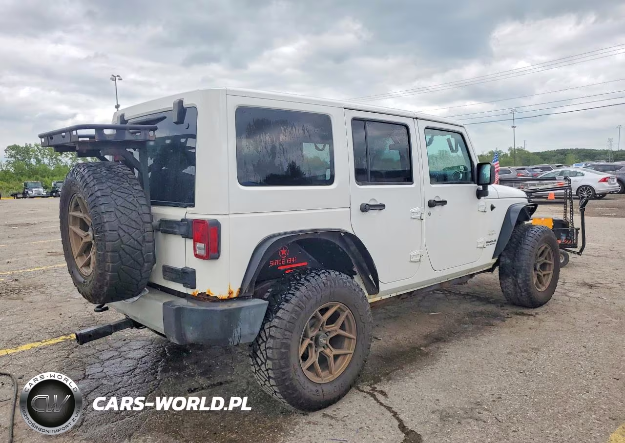 2011 Jeep Wrangler Unlimited Sahara VIN:1J4BA5H15BL576212 - 3