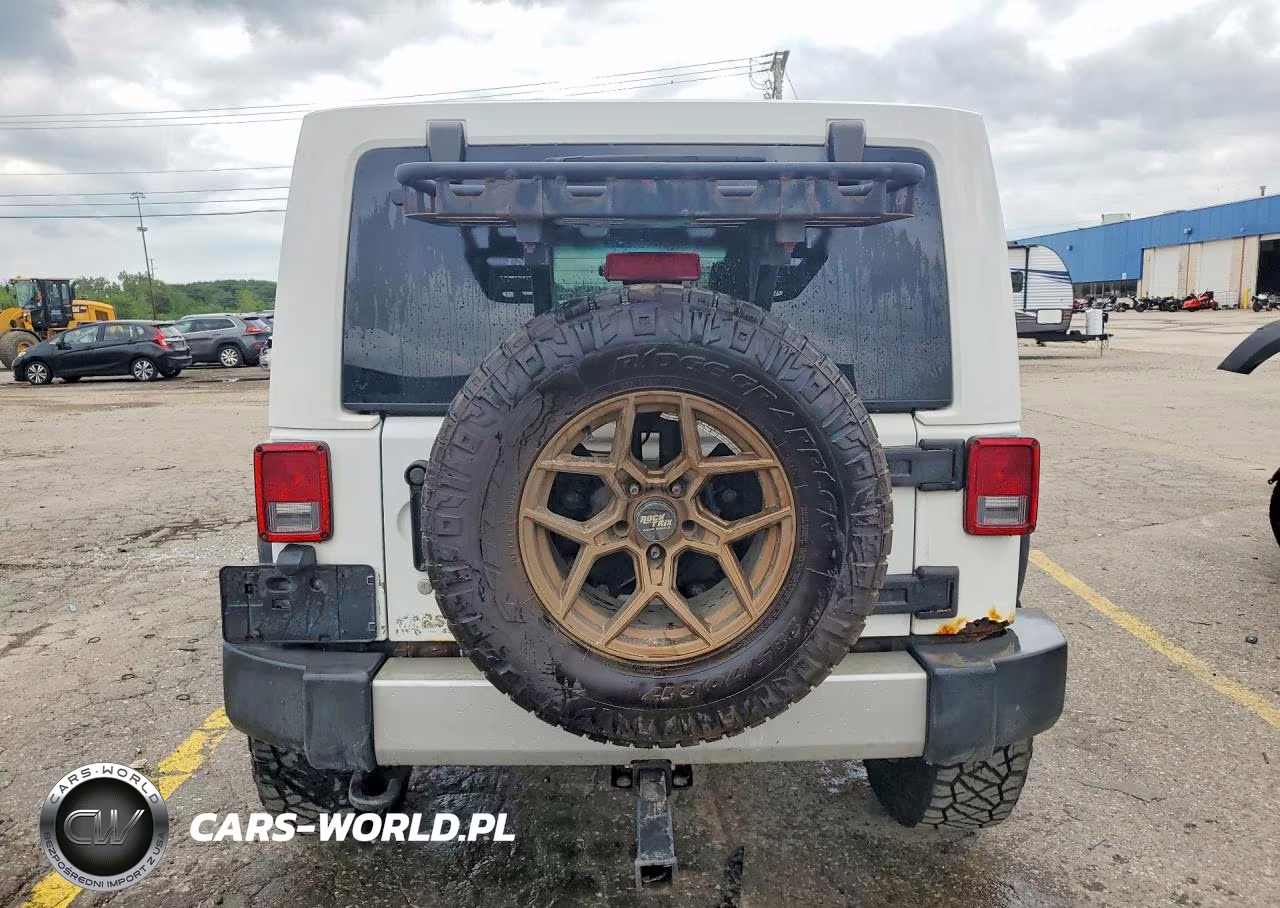 2011 Jeep Wrangler Unlimited Sahara VIN:1J4BA5H15BL576212 - 6