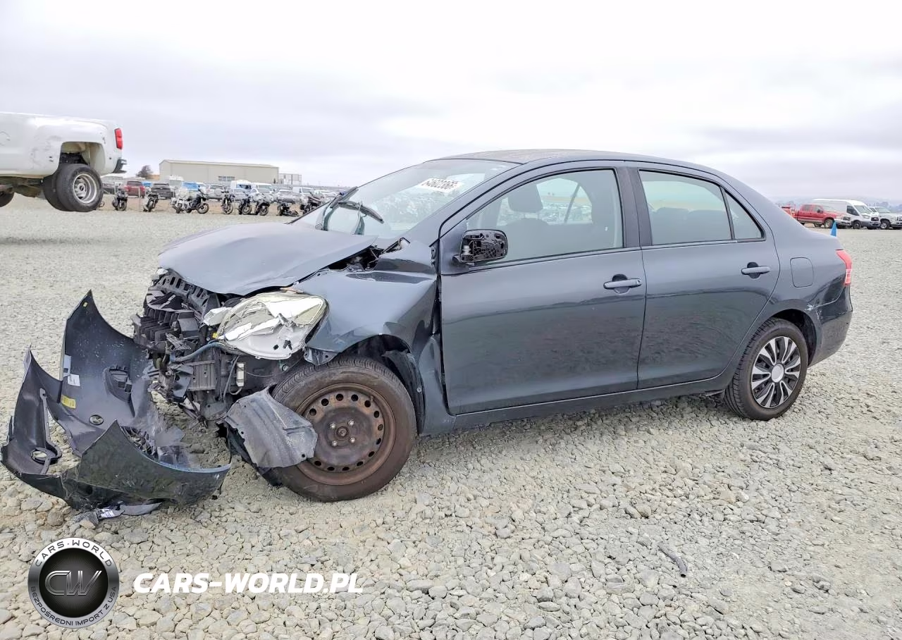 2009 Toyota Yaris Base VIN:JTDBT903791307865 - 1