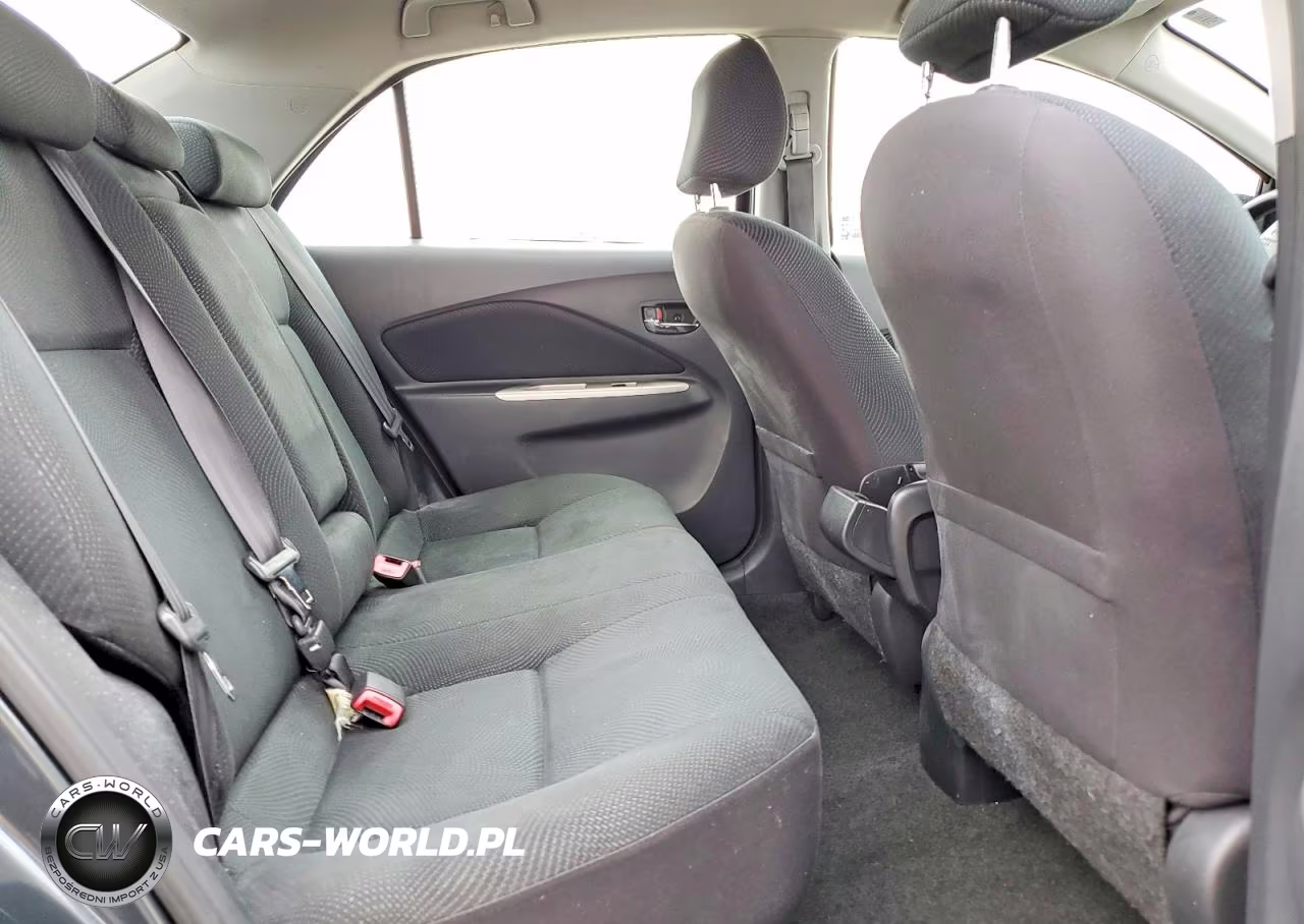 2009 Toyota Yaris Base VIN:JTDBT903791307865 - 10