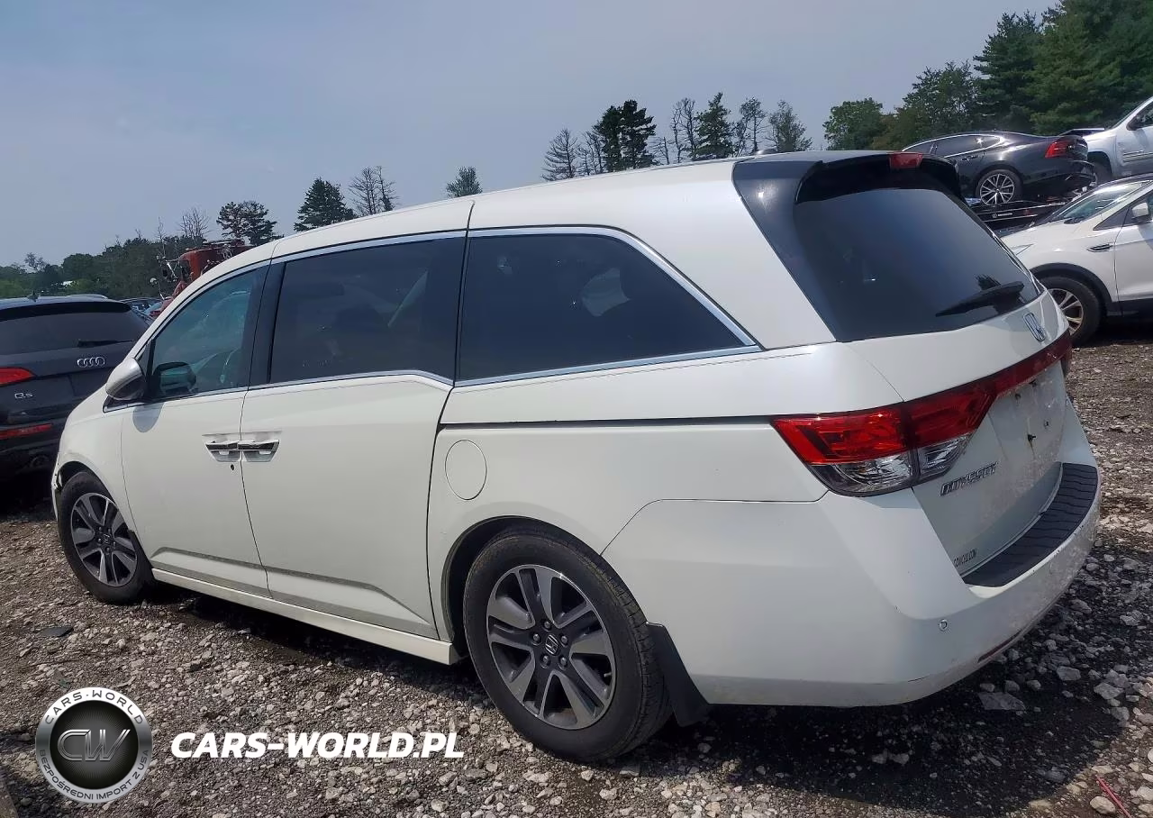 2016 Honda Odyssey Touring VIN:5FNRL5H90GB080023 - 2