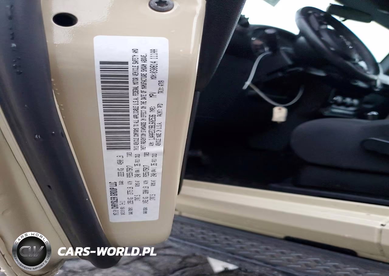 2011 Jeep Wrangler Sport VIN:1J4AA2D19BL602536 - 12