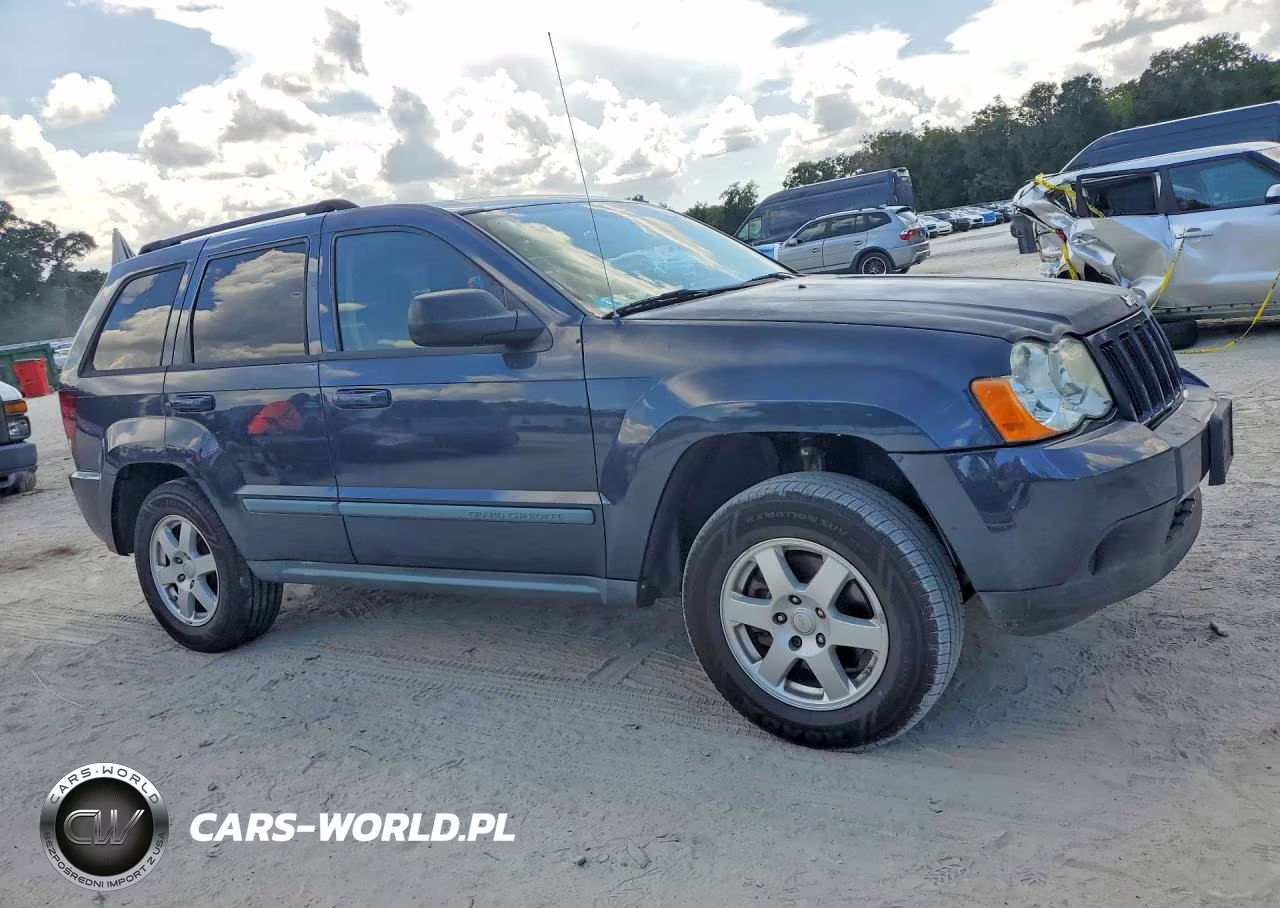 2009 Jeep Grand Cherokee Laredo VIN:1J8GR48K09C528045 - 4