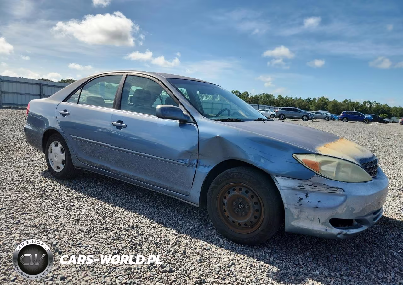 2003 Toyota Camry Le VIN:JTDBE32K430232454 - 4