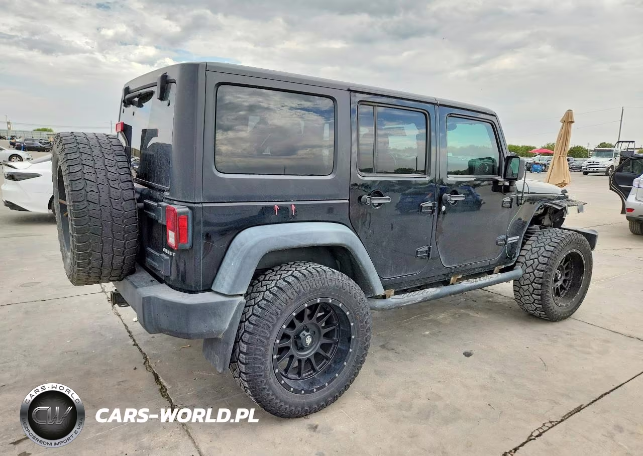 2012 Jeep Wrangler Unlimited Rubicon VIN:1C4BJWFG5CL206690 - 3