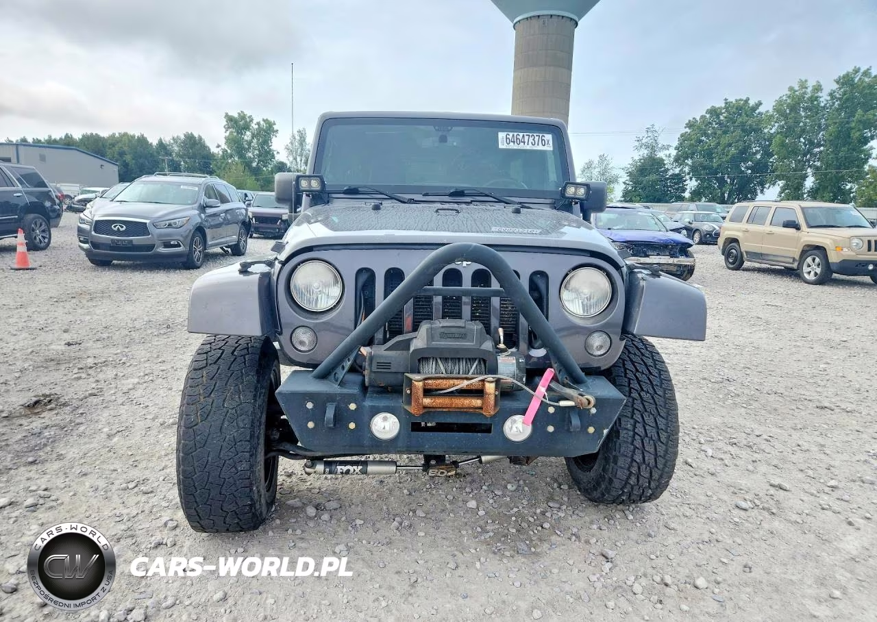 2014 Jeep Wrangler Unlimited Sahara VIN:1C4BJWEG2EL258623 - 5
