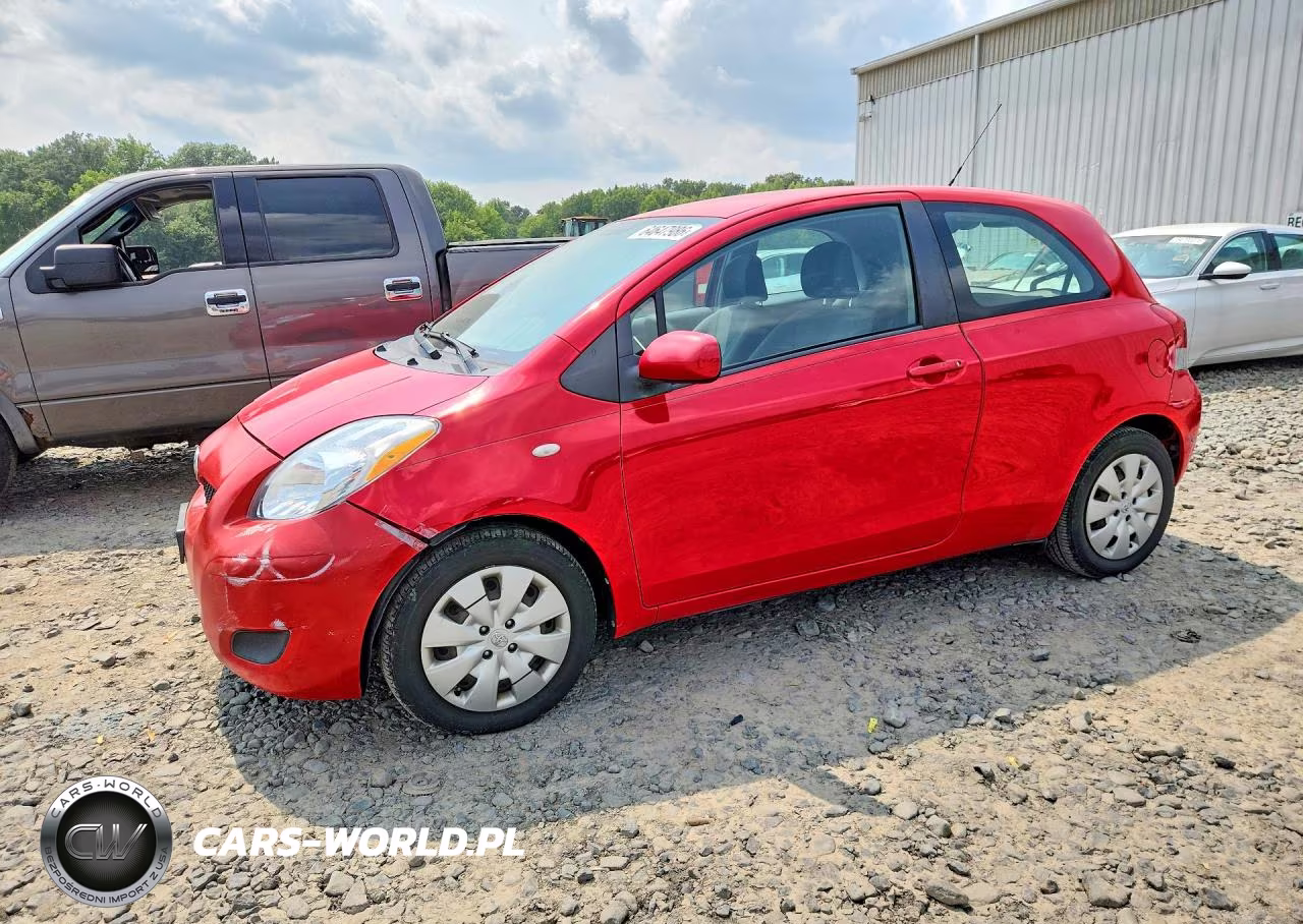2009 Toyota Yaris Base VIN:JTDJT903795224019 - 1