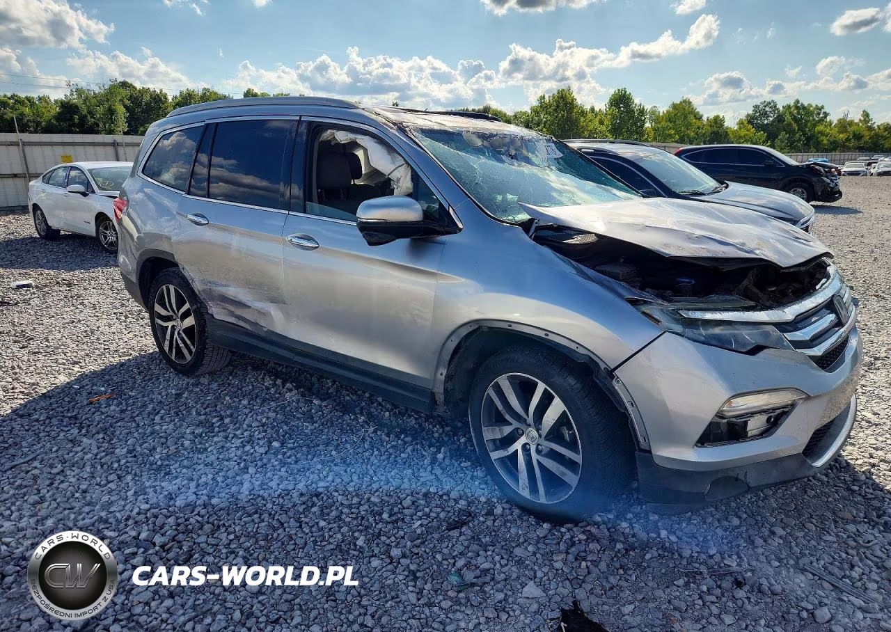 2017 Honda Pilot Touring VIN:5FNYF5H97HB023354 - 4