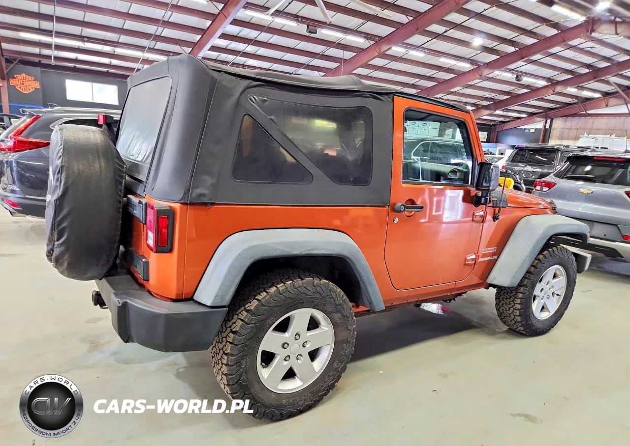 2011 Jeep Wrangler Sport VIN:1J4AA2D18BL569142 - 3