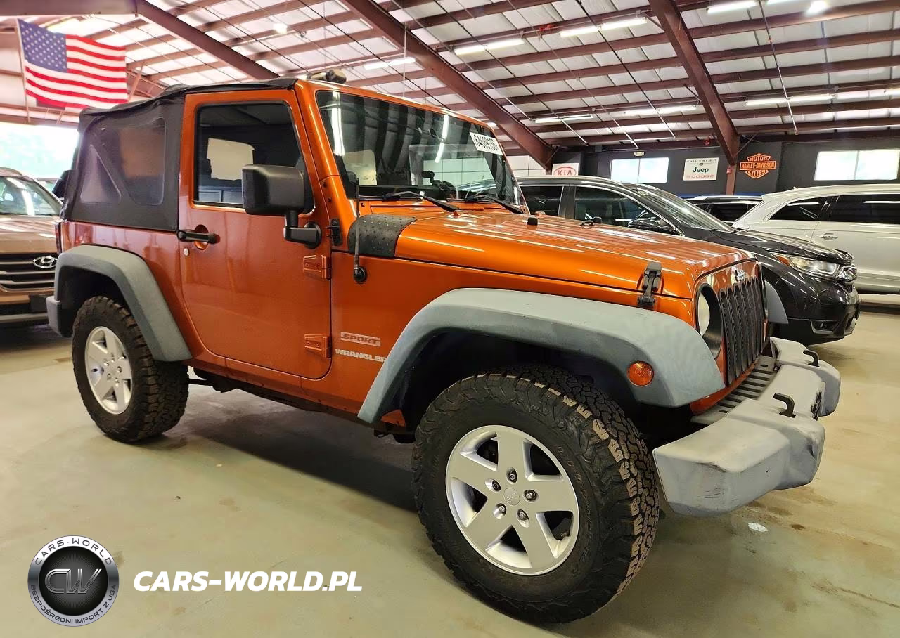 2011 Jeep Wrangler Sport VIN:1J4AA2D18BL569142 - 4