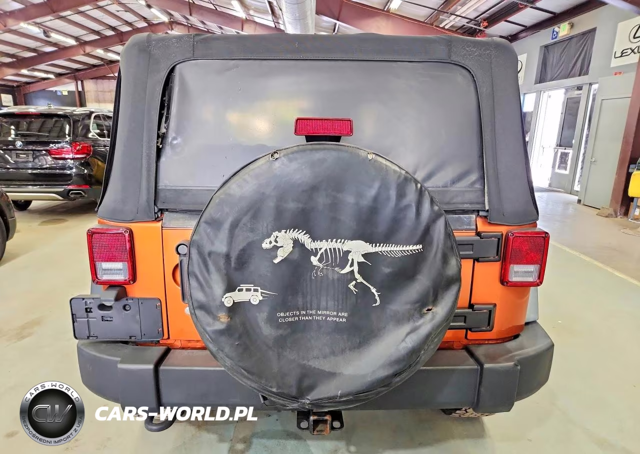 2011 Jeep Wrangler Sport VIN:1J4AA2D18BL569142 - 6