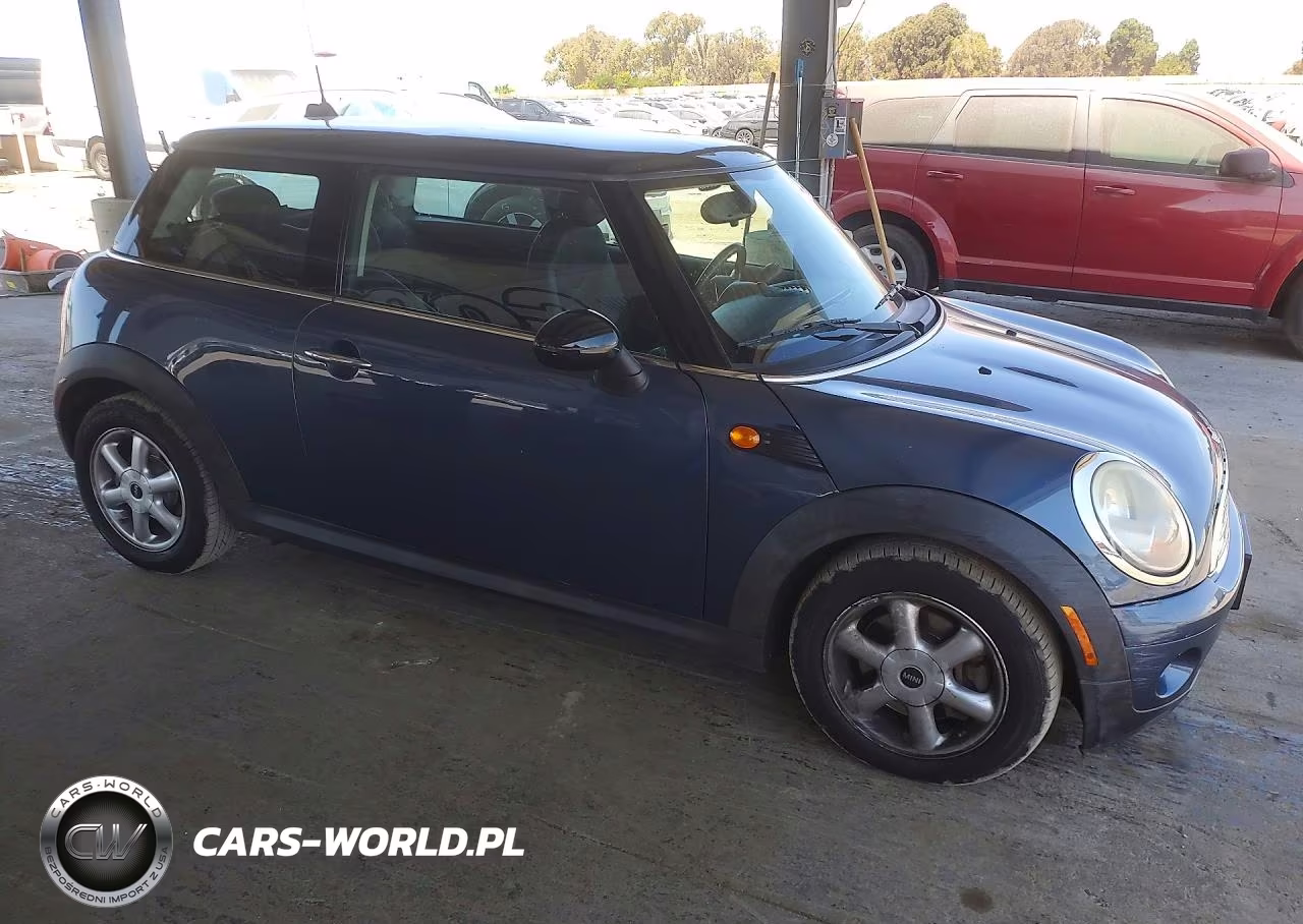 2010 Mini Cooper VIN:WMWMF3C51ATZ66394 - 4