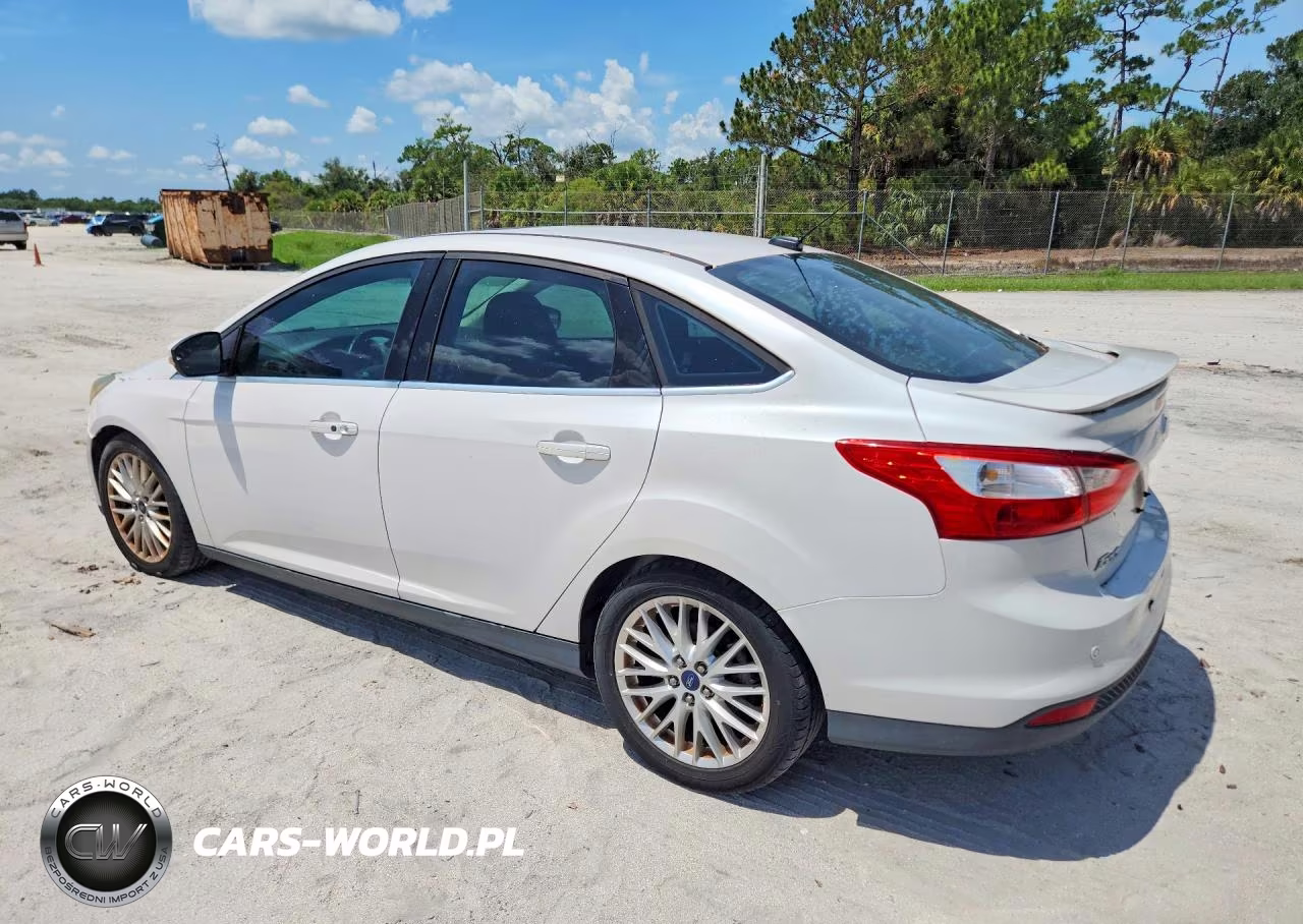 2014 Ford Focus Titanium VIN:1FADP3J21EL240653 - 2