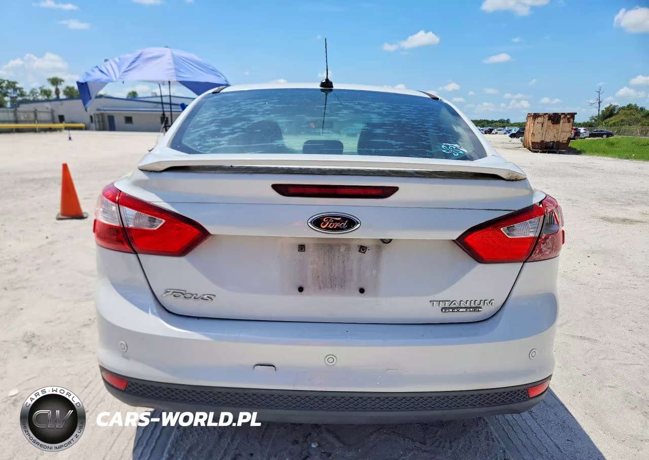 2014 Ford Focus Titanium VIN:1FADP3J21EL240653 - 6