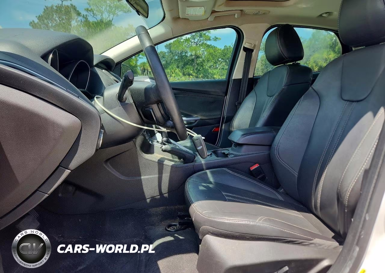 2014 Ford Focus Titanium VIN:1FADP3J21EL240653 - 7