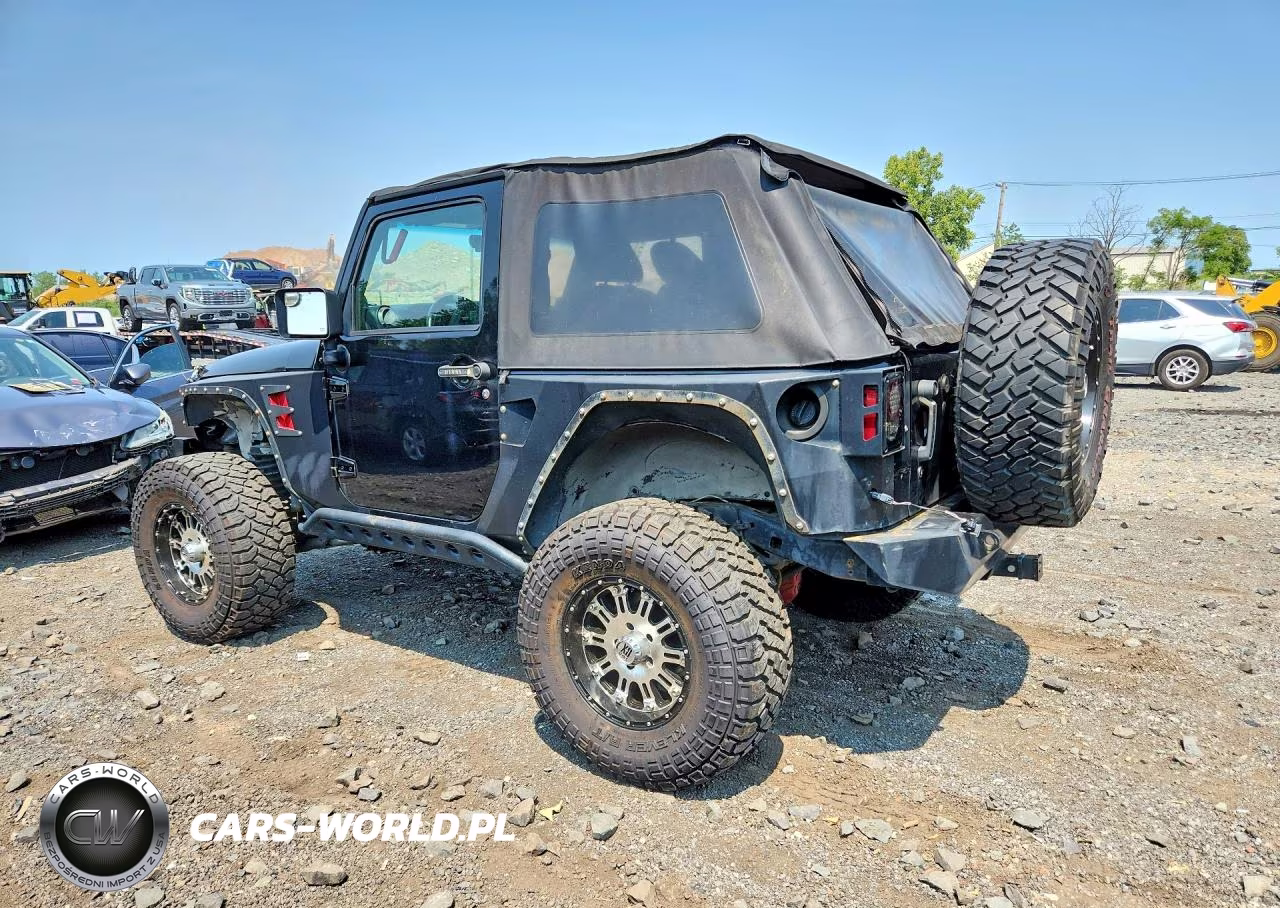 2011 Jeep Wrangler Sport VIN:1J4AA2D15BL516110 - 2