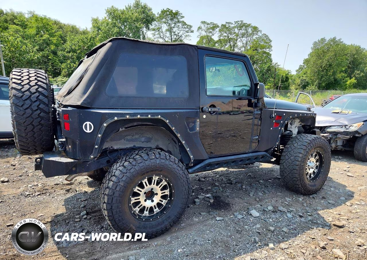 2011 Jeep Wrangler Sport VIN:1J4AA2D15BL516110 - 3