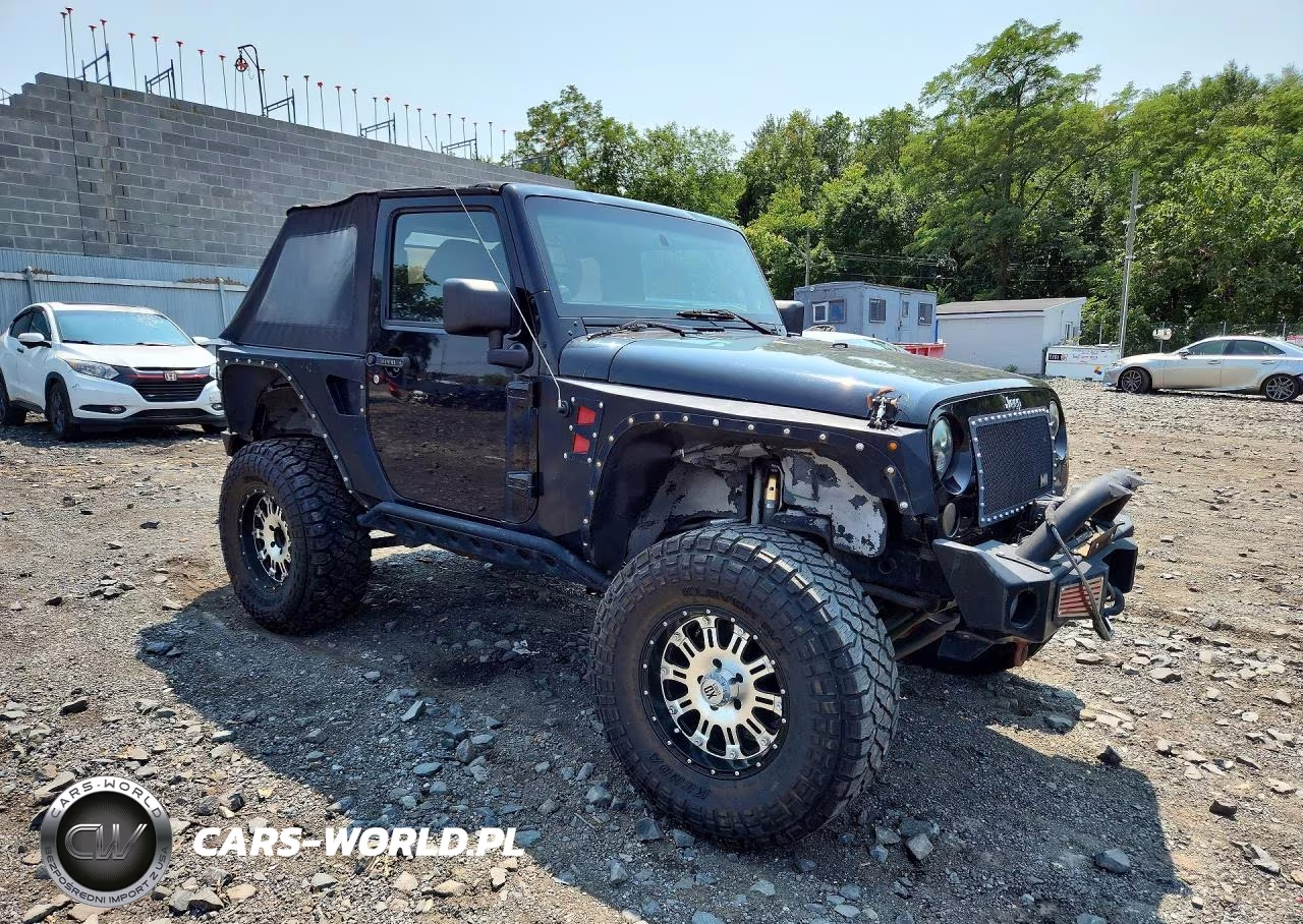 2011 Jeep Wrangler Sport VIN:1J4AA2D15BL516110 - 4