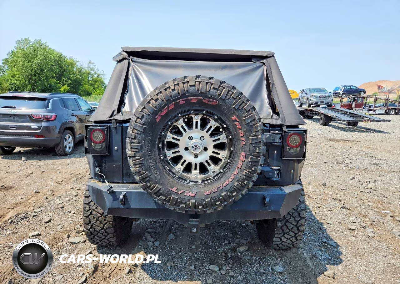2011 Jeep Wrangler Sport VIN:1J4AA2D15BL516110 - 6
