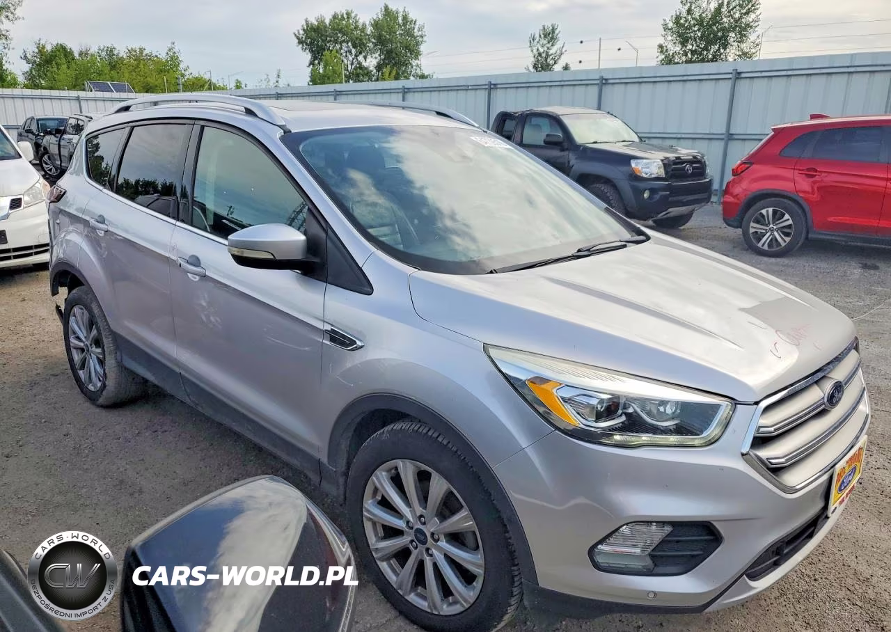 2017 Ford Escape Titanium VIN:1FMCU0JD0HUC33332 - 4