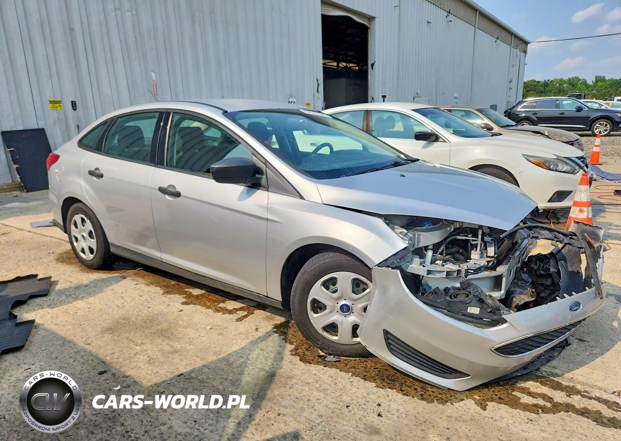 2017 Ford Focus S VIN:1FADP3E26HL335675 - 4