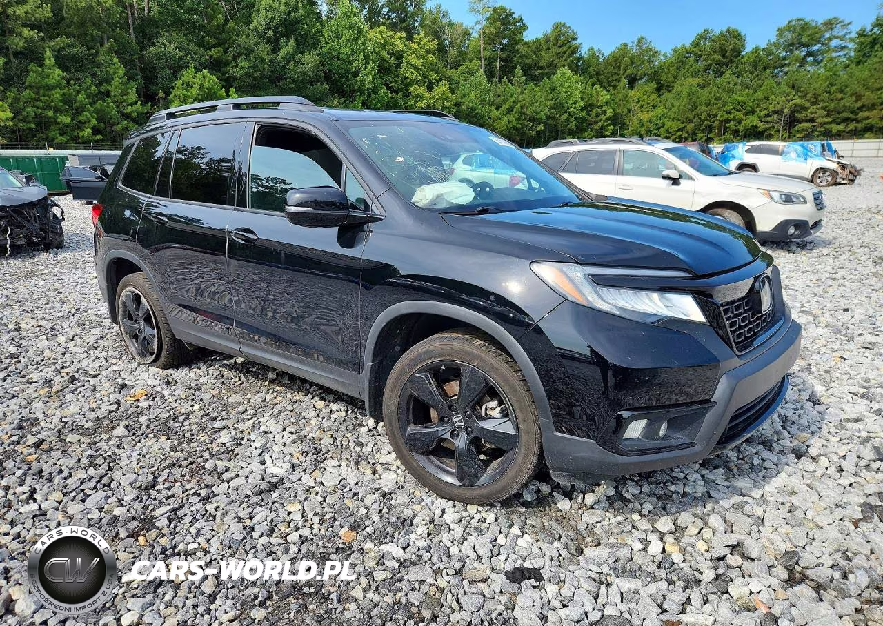 2021 Honda Passport Elite VIN:5FNYF8H03MB035417 - 4