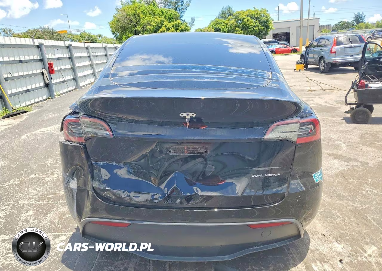2024 Tesla Model Y VIN:7SAYGDED4RF202522 - 6