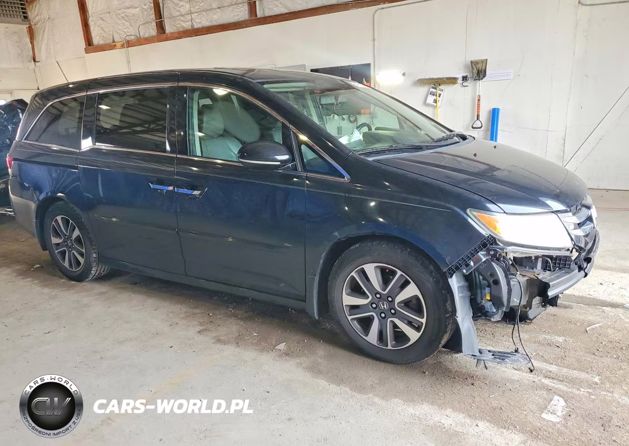2016 Honda Odyssey Touring VIN:5FNRL5H90GB002700 - 4