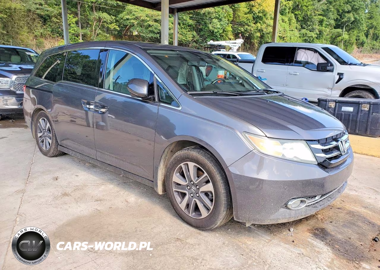 2015 Honda Odyssey Touring VIN:5FNRL5H91FB014353 - 4