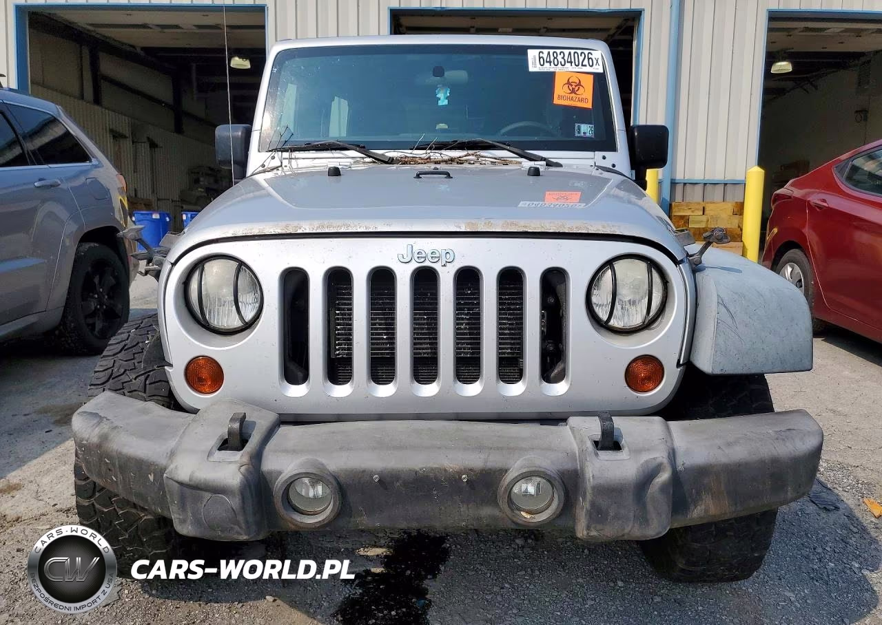 2012 Jeep Wrangler Unlimited Sport VIN:1C4BJWDG3CL101648 - 5
