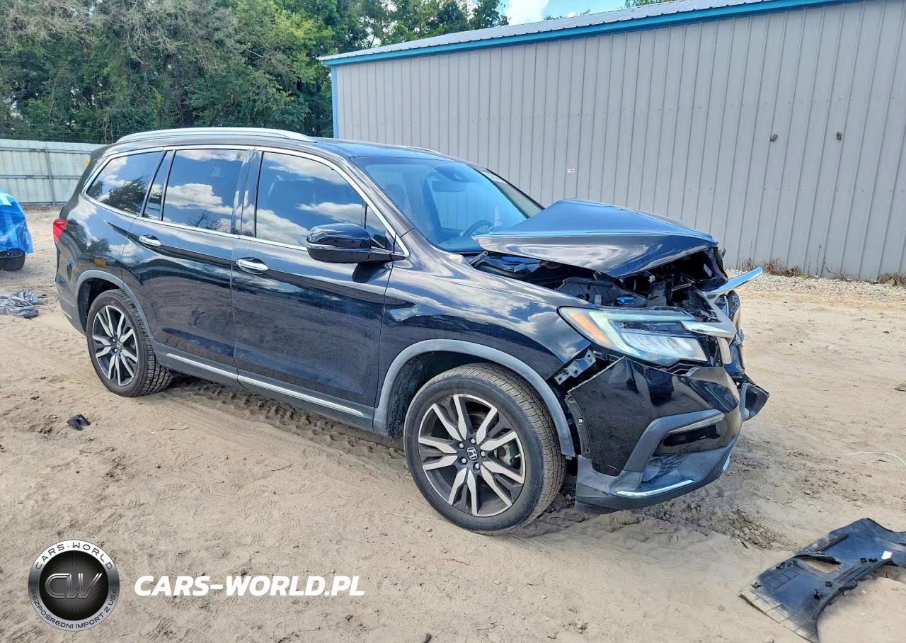 2020 Honda Pilot Touring VIN:5FNYF5H67LB009517 - 4