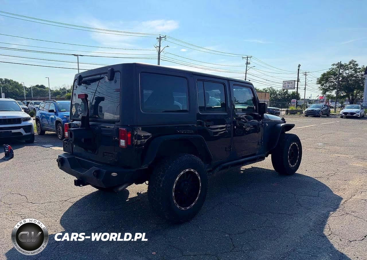 2016 Jeep Wrangler Unlimited Sport VIN:1C4BJWDG3GL194273 - 4