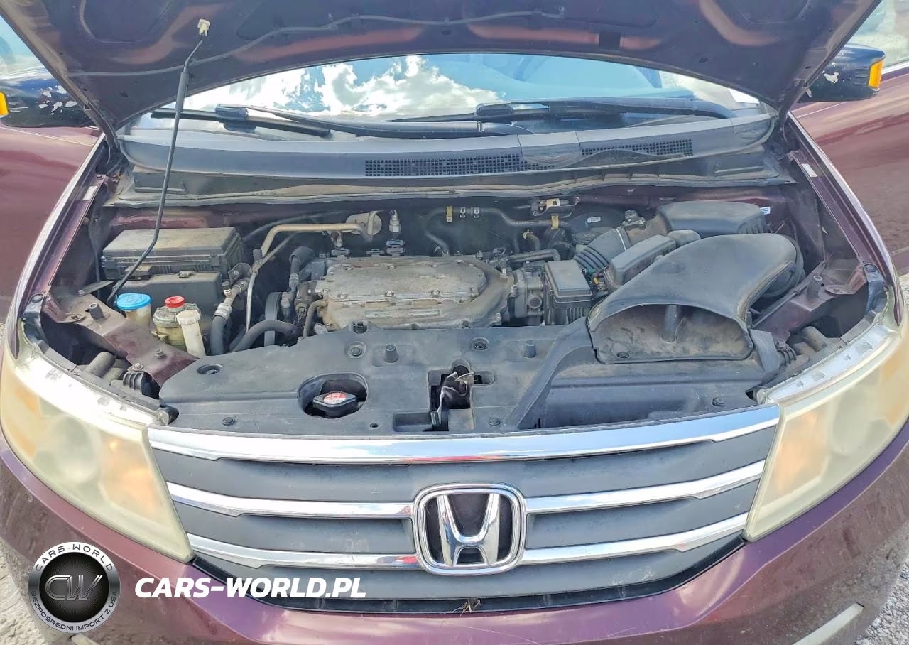 2012 Honda Odyssey Touring VIN:5FNRL5H90CB133572 - 12