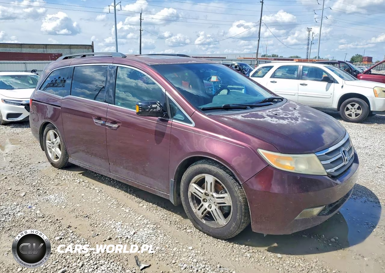2012 Honda Odyssey Touring VIN:5FNRL5H90CB133572 - 4