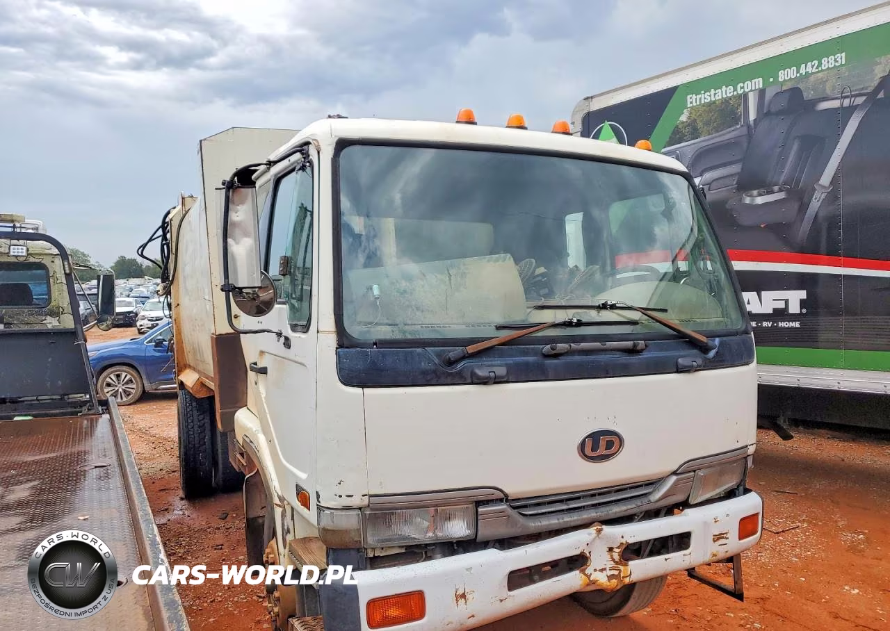 1999 Ud Ud2300 Refuse Truck VIN:JNALC43H4XGN50061 - 4