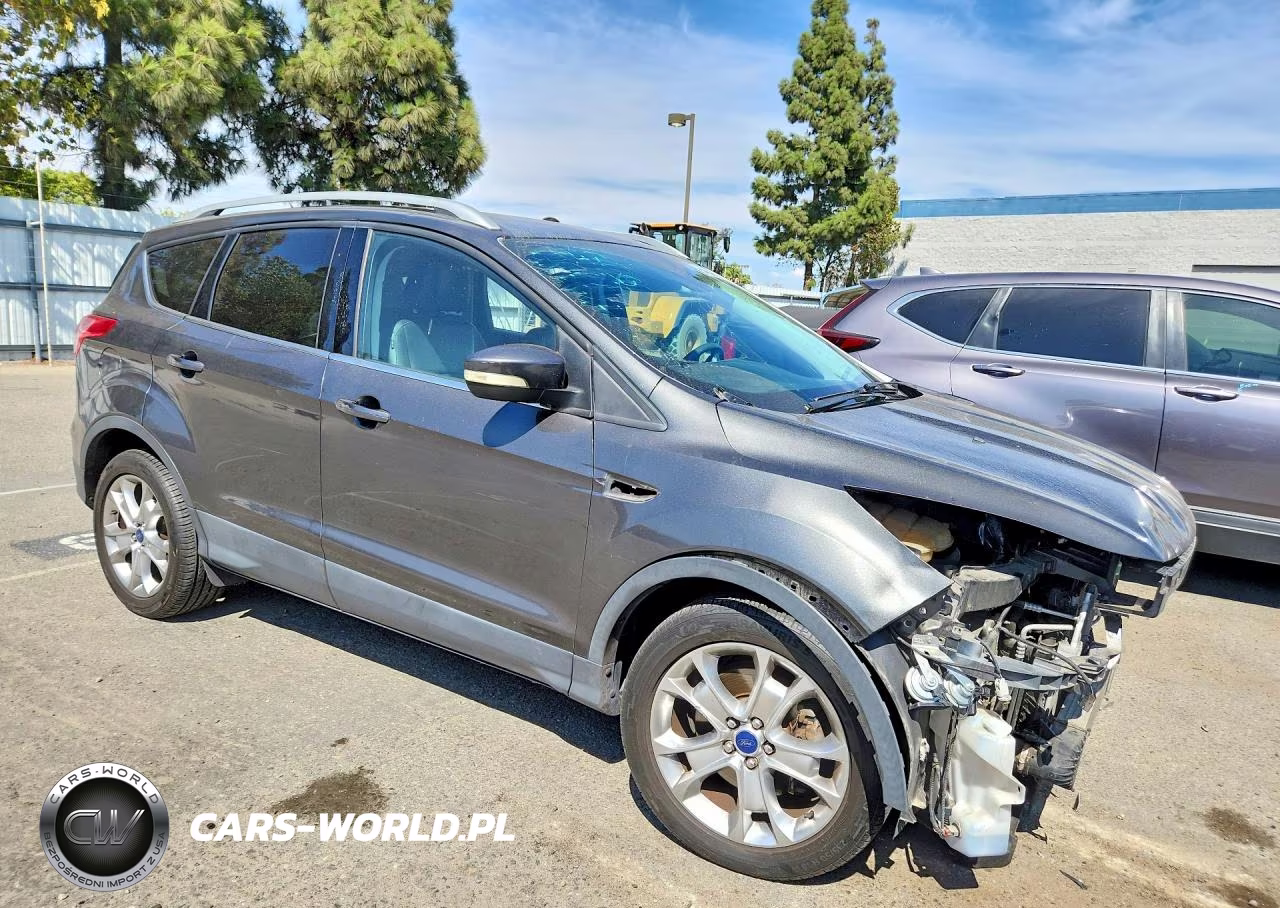 2016 Ford Escape Titanium VIN:1FMCU0J98GUB01185 - 4